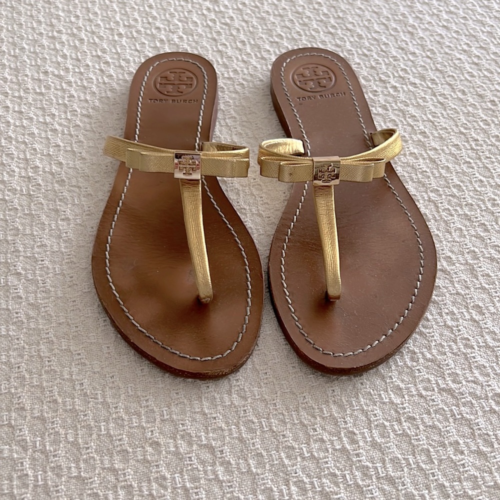 Tory Burch leather sandals with gold bows